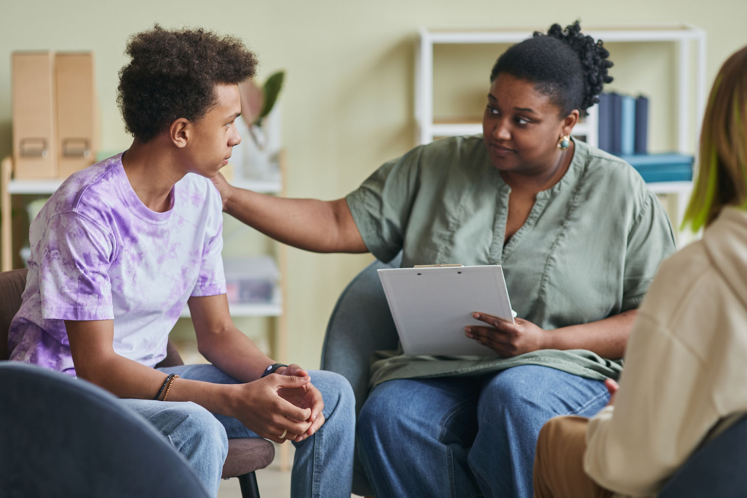 Counselor helping teen