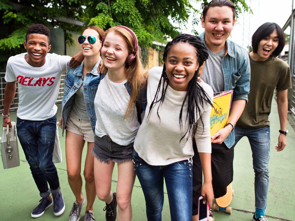 Diverse group of smiling teens having fun